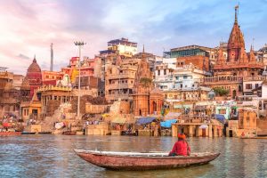 India Varanasi city Ganges met boot