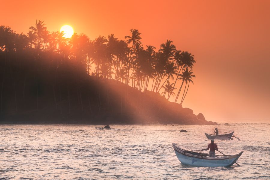 Sri Lanka Negombo ondergaande zon met bootjes