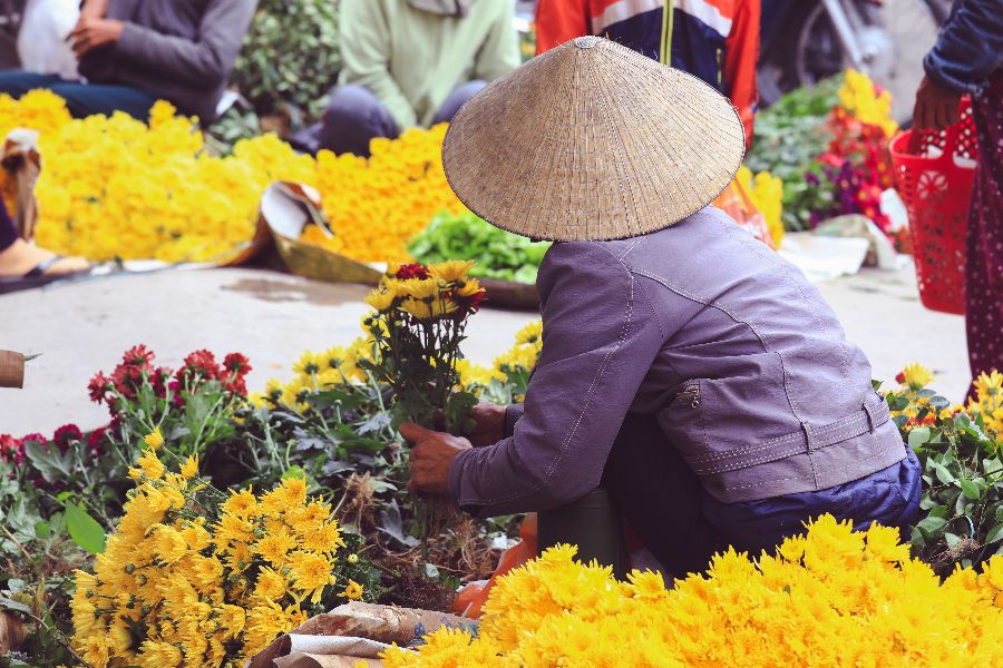 vietnam ho chi minh city saigon ho chi minhstad markt bloemen verkoopster